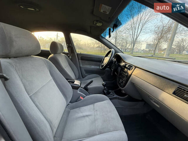 Серый Шевроле Лачетти, объемом двигателя 1.8 л и пробегом 290 тыс. км за 4500 $, фото 11 на Automoto.ua