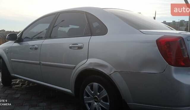 Серый Шевроле Лачетти, объемом двигателя 1.6 л и пробегом 210 тыс. км за 5200 $, фото 2 на Automoto.ua
