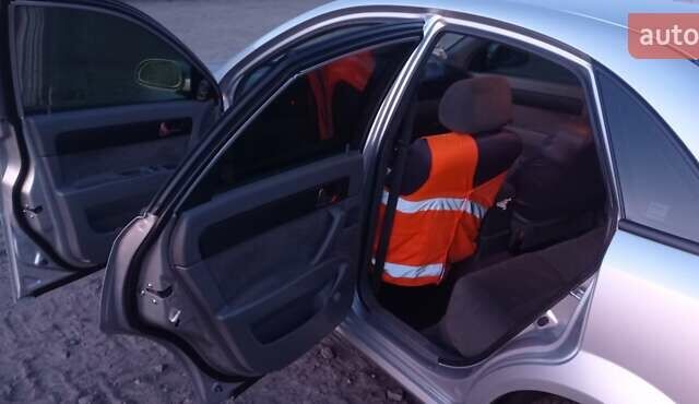 Серый Шевроле Лачетти, объемом двигателя 1.8 л и пробегом 354 тыс. км за 4200 $, фото 6 на Automoto.ua