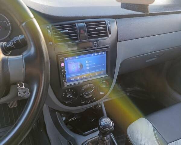 Сірий Шевроле Лачетті, об'ємом двигуна 1.6 л та пробігом 182 тис. км за 4700 $, фото 5 на Automoto.ua