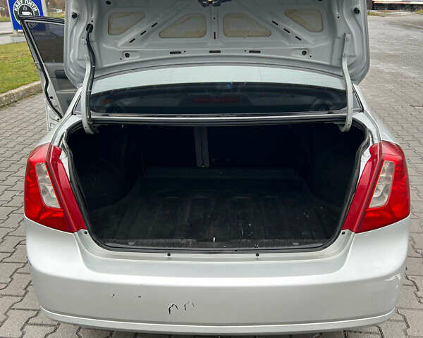 Серый Шевроле Лачетти, объемом двигателя 1.8 л и пробегом 250 тыс. км за 4600 $, фото 11 на Automoto.ua