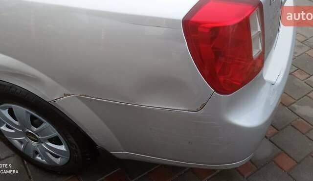 Серый Шевроле Лачетти, объемом двигателя 1.6 л и пробегом 210 тыс. км за 5200 $, фото 9 на Automoto.ua