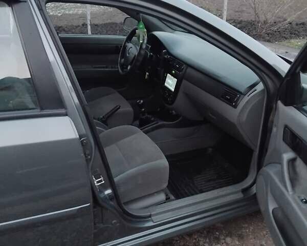 Серый Шевроле Лачетти, объемом двигателя 1.6 л и пробегом 111 тыс. км за 5500 $, фото 11 на Automoto.ua