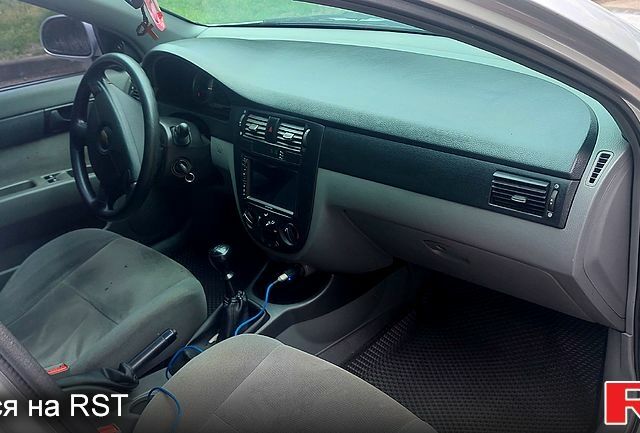 Серый Шевроле Лачетти, объемом двигателя 1.6 л и пробегом 299 тыс. км за 3950 $, фото 1 на Automoto.ua