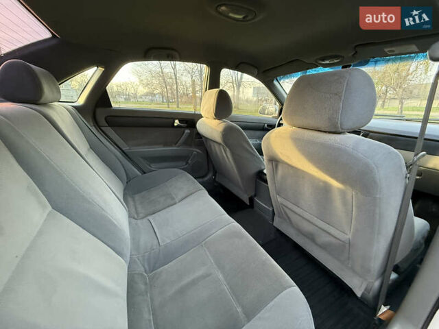 Серый Шевроле Лачетти, объемом двигателя 1.8 л и пробегом 290 тыс. км за 4500 $, фото 13 на Automoto.ua