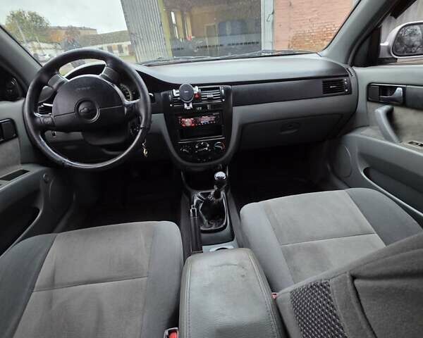 Сірий Шевроле Лачетті, об'ємом двигуна 1.8 л та пробігом 220 тис. км за 3900 $, фото 4 на Automoto.ua