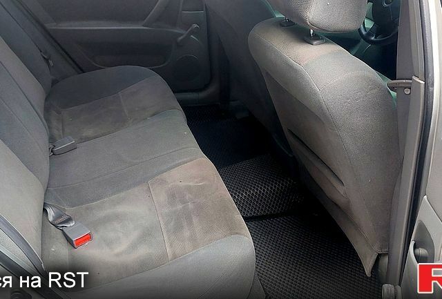 Серый Шевроле Лачетти, объемом двигателя 1.6 л и пробегом 299 тыс. км за 3950 $, фото 2 на Automoto.ua