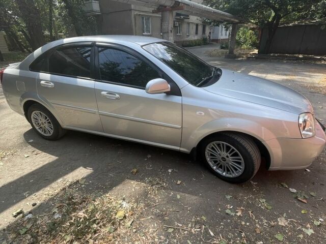 Серый Шевроле Лачетти, объемом двигателя 1.8 л и пробегом 220 тыс. км за 4600 $, фото 5 на Automoto.ua