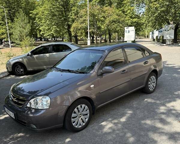 Серый Шевроле Лачетти, объемом двигателя 1.8 л и пробегом 158 тыс. км за 5400 $, фото 2 на Automoto.ua