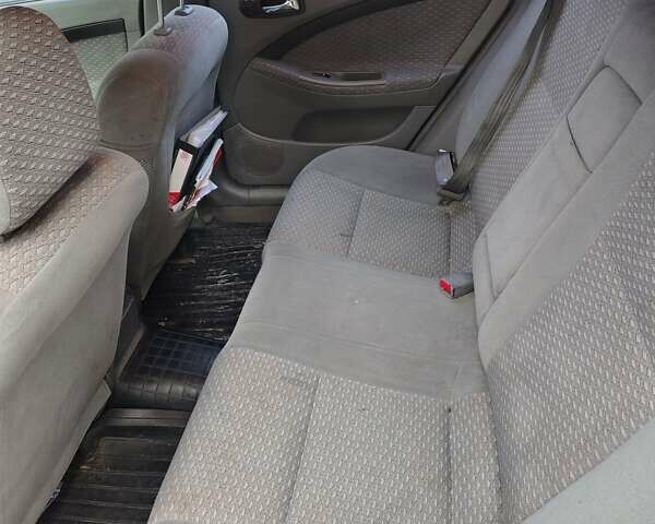 Серый Шевроле Лачетти, объемом двигателя 1.8 л и пробегом 263 тыс. км за 3100 $, фото 3 на Automoto.ua