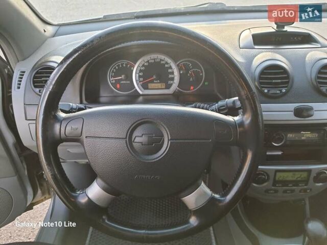 Серый Шевроле Лачетти, объемом двигателя 1.8 л и пробегом 270 тыс. км за 4500 $, фото 14 на Automoto.ua