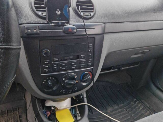 Серый Шевроле Лачетти, объемом двигателя 1.8 л и пробегом 276 тыс. км за 3300 $, фото 2 на Automoto.ua