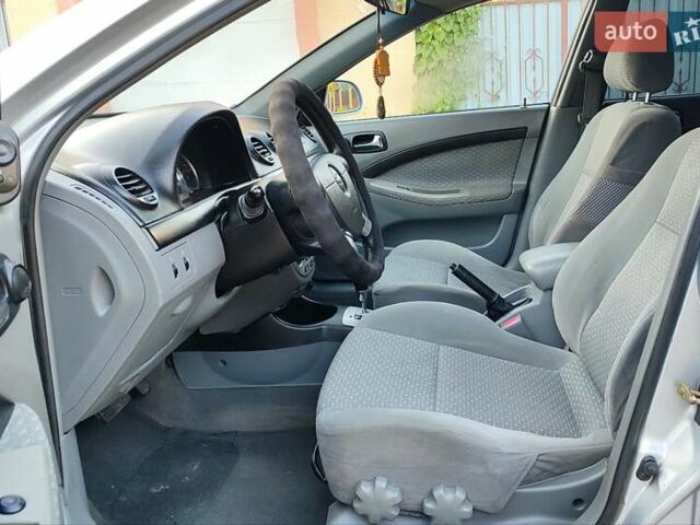 Серый Шевроле Лачетти, объемом двигателя 1.8 л и пробегом 280 тыс. км за 4750 $, фото 9 на Automoto.ua