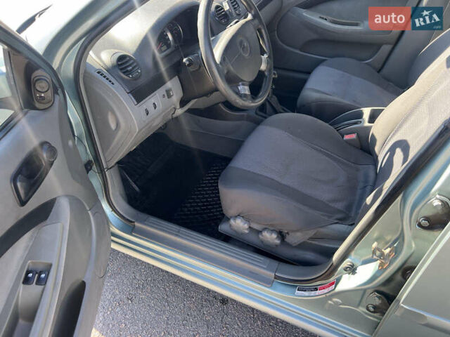 Сірий Шевроле Лачетті, об'ємом двигуна 1.6 л та пробігом 237 тис. км за 3900 $, фото 8 на Automoto.ua