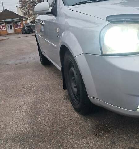 Серый Шевроле Лачетти, объемом двигателя 1.79 л и пробегом 250 тыс. км за 4100 $, фото 2 на Automoto.ua