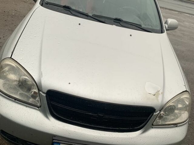 Серый Шевроле Лачетти, объемом двигателя 1.8 л и пробегом 250 тыс. км за 3099 $, фото 3 на Automoto.ua