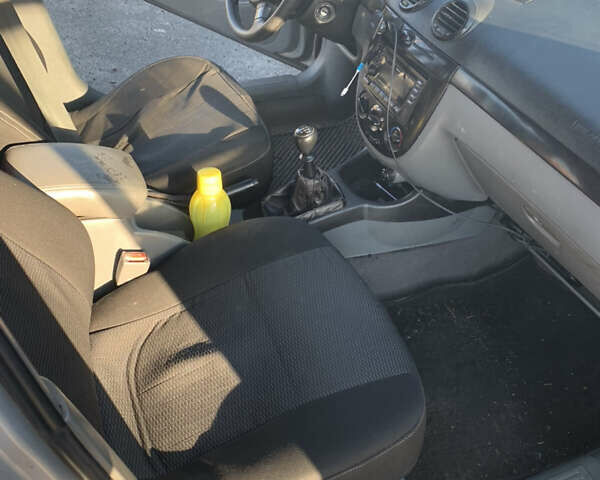 Сірий Шевроле Лачетті, об'ємом двигуна 1.8 л та пробігом 245 тис. км за 3399 $, фото 9 на Automoto.ua