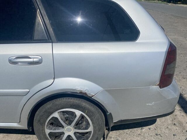 Серый Шевроле Лачетти, объемом двигателя 1.8 л и пробегом 270 тыс. км за 2899 $, фото 1 на Automoto.ua