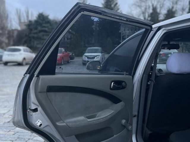 Сірий Шевроле Лачетті, об'ємом двигуна 1.8 л та пробігом 300 тис. км за 3499 $, фото 12 на Automoto.ua