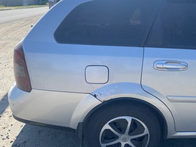 Серый Шевроле Лачетти, объемом двигателя 1.8 л и пробегом 270 тыс. км за 2899 $, фото 4 на Automoto.ua