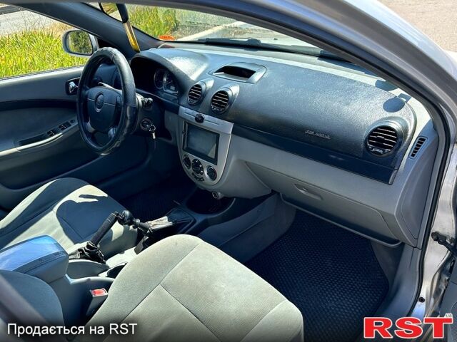 Серый Шевроле Лачетти, объемом двигателя 1.6 л и пробегом 250 тыс. км за 3950 $, фото 9 на Automoto.ua