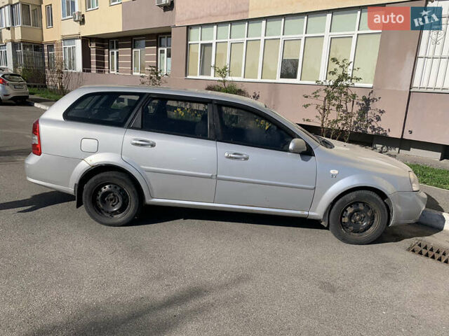Сірий Шевроле Лачетті, об'ємом двигуна 1.8 л та пробігом 245 тис. км за 3399 $, фото 1 на Automoto.ua