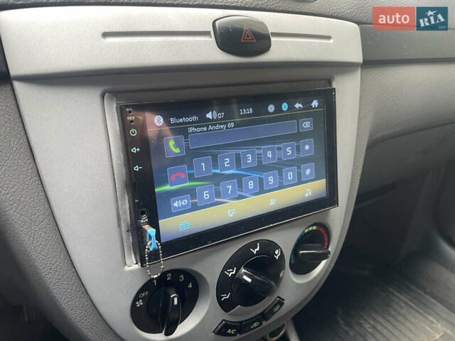 Серый Шевроле Лачетти, объемом двигателя 1.6 л и пробегом 320 тыс. км за 4800 $, фото 4 на Automoto.ua