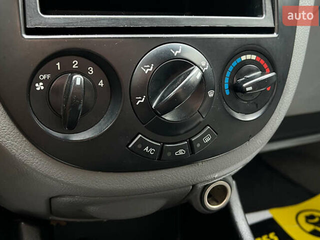 Сірий Шевроле Лачетті, об'ємом двигуна 1.8 л та пробігом 70 тис. км за 6999 $, фото 10 на Automoto.ua