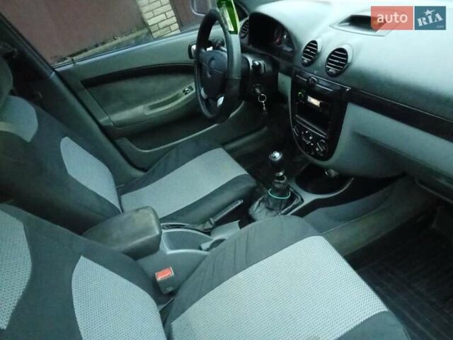 Серый Шевроле Лачетти, объемом двигателя 1.8 л и пробегом 256 тыс. км за 3000 $, фото 5 на Automoto.ua