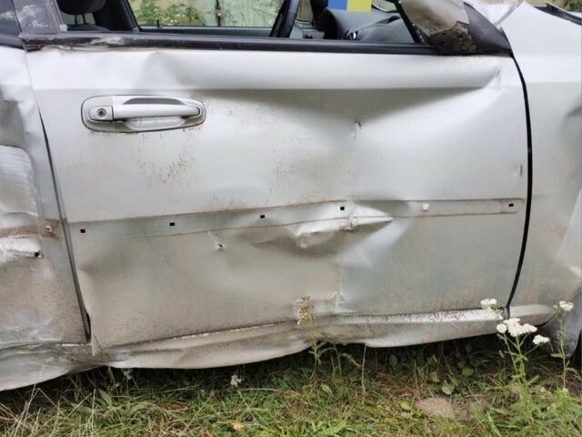 Серый Шевроле Лачетти, объемом двигателя 1.8 л и пробегом 250 тыс. км за 1400 $, фото 4 на Automoto.ua