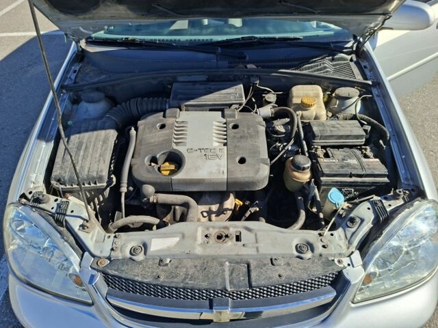 Серый Шевроле Лачетти, объемом двигателя 1.8 л и пробегом 212 тыс. км за 3500 $, фото 6 на Automoto.ua