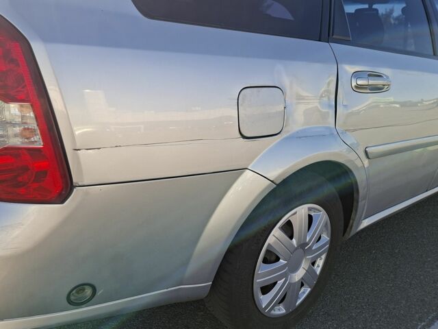 Серый Шевроле Лачетти, объемом двигателя 1.8 л и пробегом 212 тыс. км за 3500 $, фото 12 на Automoto.ua