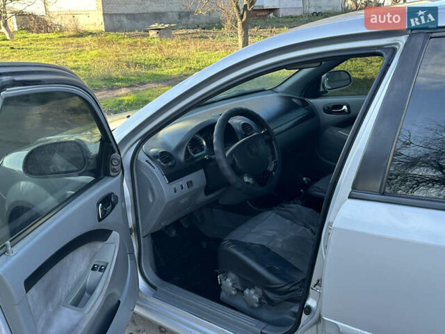 Сірий Шевроле Лачетті, об'ємом двигуна 1.8 л та пробігом 231 тис. км за 3900 $, фото 12 на Automoto.ua
