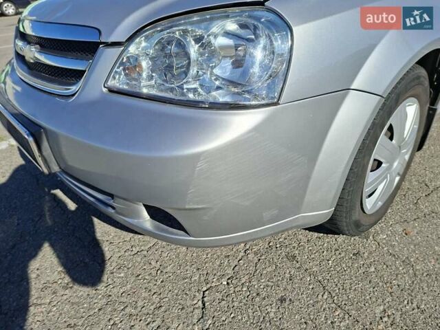 Серый Шевроле Лачетти, объемом двигателя 1.8 л и пробегом 212 тыс. км за 3500 $, фото 4 на Automoto.ua