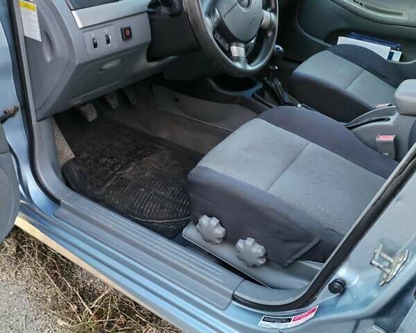 Серый Шевроле Лачетти, объемом двигателя 1.6 л и пробегом 240 тыс. км за 4400 $, фото 13 на Automoto.ua