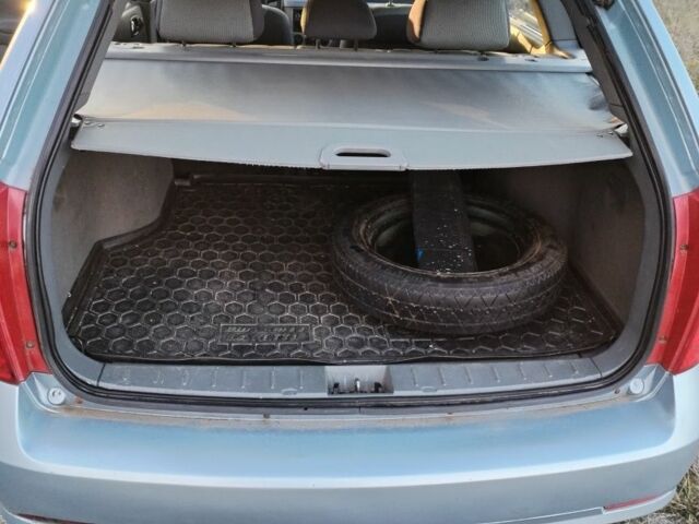 Серый Шевроле Лачетти, объемом двигателя 1.6 л и пробегом 240 тыс. км за 4400 $, фото 3 на Automoto.ua