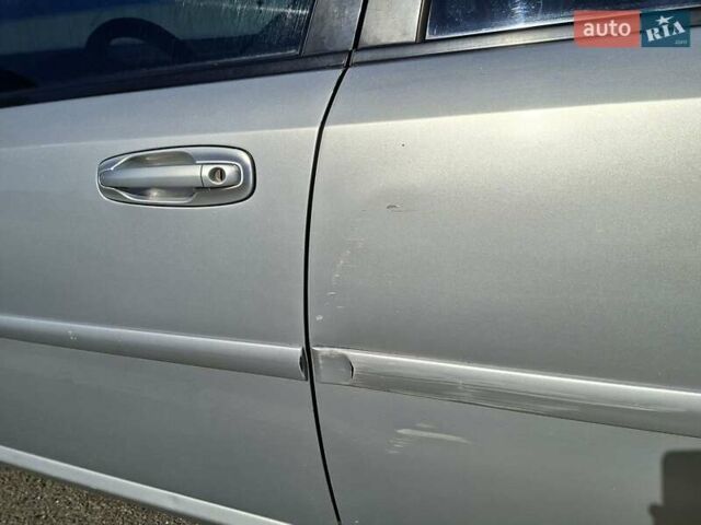Серый Шевроле Лачетти, объемом двигателя 1.8 л и пробегом 212 тыс. км за 3500 $, фото 2 на Automoto.ua