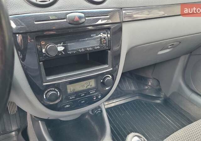 Серый Шевроле Лачетти, объемом двигателя 1.6 л и пробегом 244 тыс. км за 5500 $, фото 19 на Automoto.ua