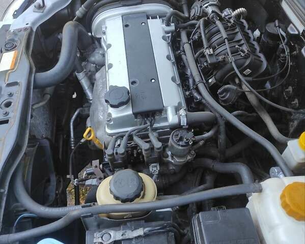 Серый Шевроле Лачетти, объемом двигателя 1.6 л и пробегом 168 тыс. км за 4500 $, фото 7 на Automoto.ua