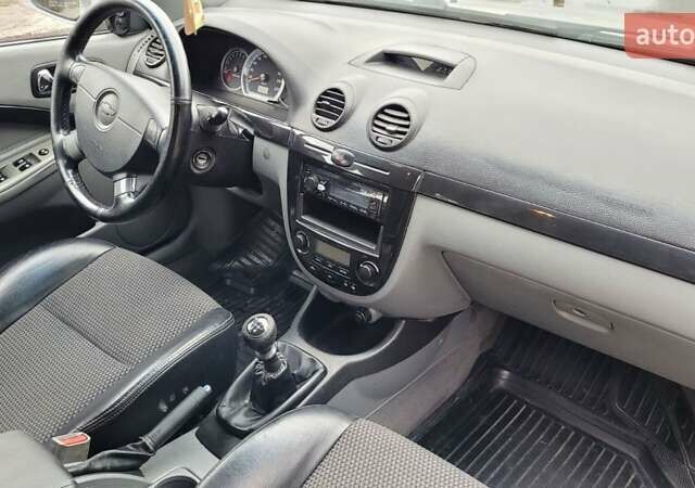 Серый Шевроле Лачетти, объемом двигателя 1.6 л и пробегом 244 тыс. км за 5500 $, фото 21 на Automoto.ua