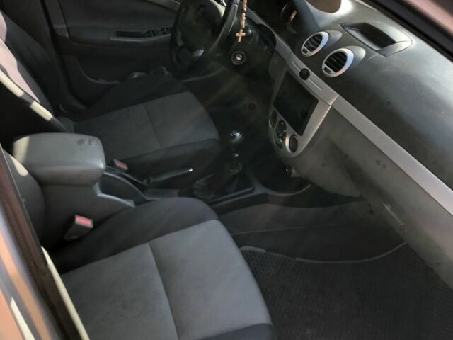 Серый Шевроле Лачетти, объемом двигателя 1.6 л и пробегом 245 тыс. км за 5999 $, фото 6 на Automoto.ua