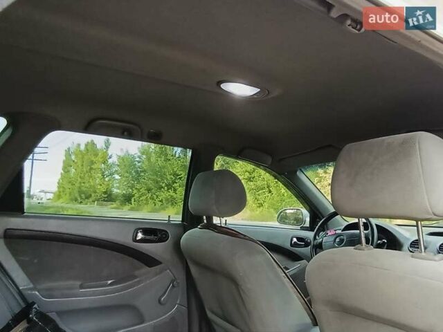 Серый Шевроле Лачетти, объемом двигателя 1.8 л и пробегом 265 тыс. км за 4750 $, фото 16 на Automoto.ua