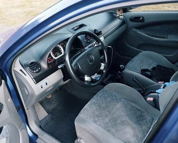 Синий Шевроле Лачетти, объемом двигателя 1.4 л и пробегом 155 тыс. км за 2900 $, фото 5 на Automoto.ua