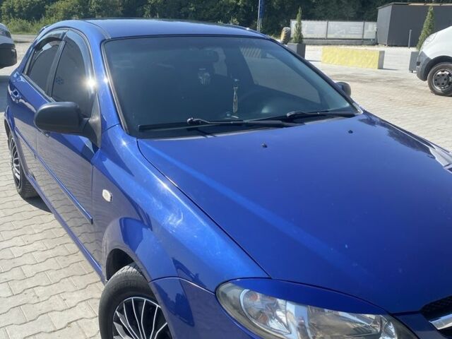 Синий Шевроле Лачетти, объемом двигателя 1.6 л и пробегом 233 тыс. км за 4038 $, фото 11 на Automoto.ua