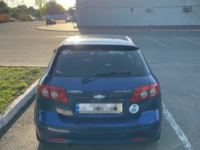 Синий Шевроле Лачетти, объемом двигателя 1.8 л и пробегом 154 тыс. км за 3700 $, фото 4 на Automoto.ua