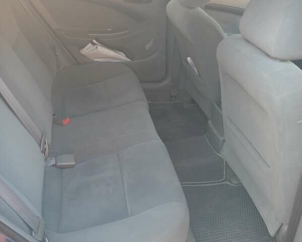 Синий Шевроле Лачетти, объемом двигателя 1.4 л и пробегом 185 тыс. км за 3900 $, фото 4 на Automoto.ua