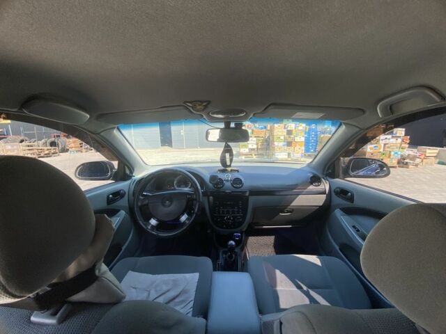 Синий Шевроле Лачетти, объемом двигателя 1.6 л и пробегом 233 тыс. км за 4038 $, фото 16 на Automoto.ua