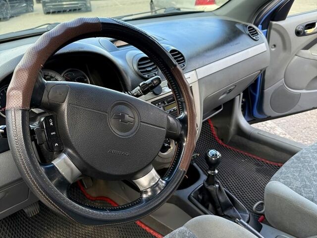 Синий Шевроле Лачетти, объемом двигателя 1.6 л и пробегом 210 тыс. км за 3500 $, фото 8 на Automoto.ua