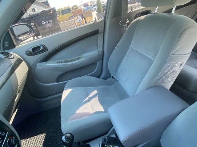 Синий Шевроле Лачетти, объемом двигателя 1.6 л и пробегом 233 тыс. км за 4038 $, фото 19 на Automoto.ua