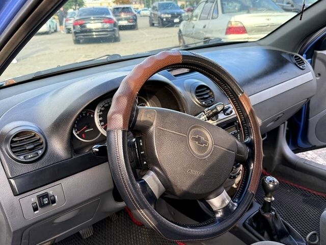 Синий Шевроле Лачетти, объемом двигателя 1.6 л и пробегом 210 тыс. км за 3500 $, фото 6 на Automoto.ua